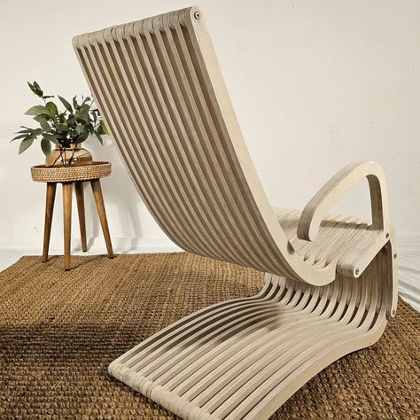 Modern parametric wooden armchair with footstool (antique white). Great for indoors and outdoors. Fully made in the United States. Looks awesome. Original stylish design that will help you stand out from the rest. Absolutely waterproof. Made of high quality birch plywood covered with natural linseed oil, that makes it fully waterproof. No chemicals used while manufacturing our furniture! Made with love for YOU! Chair dimensions length-width-height 33"*21"*39". The footstool dimensions length-... Wooden Armchair, Chair Dimensions, Linseed Oil, Antique White, Birch Plywood, Stylish Design, Plywood, Chemicals, With Love