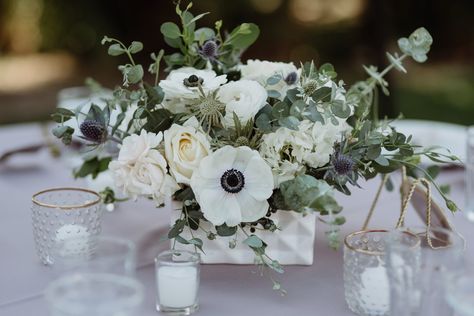 Neutral wedding flowers with black and white anemones and blue thistle at 29 Palms Inn, California. Photographer: June Cochran. Wedding Planner, Art & Soul Events Anemone Centerpiece, Anemone Wedding, Rustic Woodland Wedding, Woodland Wedding Inspiration, Wedding Flower Guide, Neutral Wedding Flowers, Rustic Garden Wedding, Party Hosting, Earthy Wedding