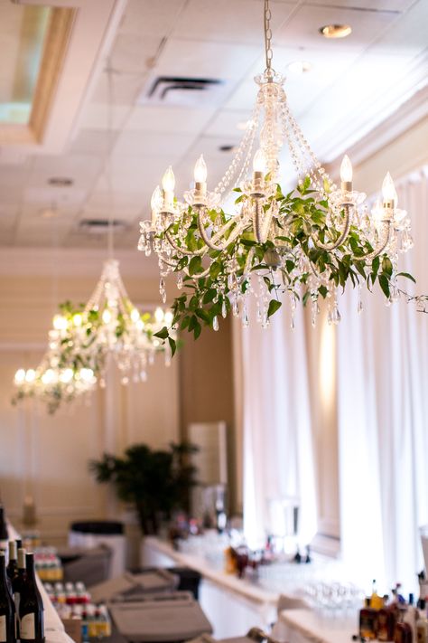 Wedding Chandelier Ideas Ceiling Decor, Chandelier With Greenery Wedding, Christmas Decor Ideas For Chandelier, Venue Chandelier, Wedding Chandelier Ideas, Chandelier With Greenery, Grapevine Ideas, Chandelier Greenery, Chandelier Wedding Decor