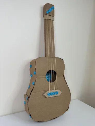 Cardboard Box Guitar Musical Instrument : 4 Steps (with Pictures) - Instructables Cardboard Musical Instruments Diy, Cardboard Guitar, Guitar Crafts, Triangular Prism, Guitar Diy, Diy Instruments, Diy Musical Instruments, Birthday Party Theme Decorations, Someone Like Me