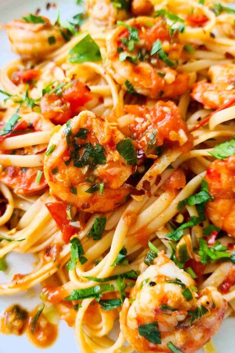 Close up of spicy shrimp pasta Spicy Garlic Shrimp Pasta, Shrimp Mexican Recipes, Simple Tomato Pasta Sauce, Spicy Shrimp Pasta Recipes, Simple Tomato Pasta, Easy Tomato Pasta Sauce, Garlic Prawn Pasta, Easy Prawn Recipes, Spicy Pasta Sauce