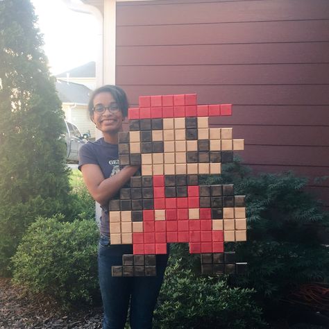 DIY Mario Pixel Wall Art Sign Tutorial | Me holding the giant pixel Mario! He's huge! Mario House, Gaming Pixel Art, Super Mario Room, Gamers Room, Mario Crafts, Mario Room, Art Nuevo, Nintendo Power, Kids Game Room