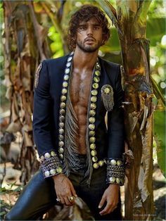 Marlon Teixeira embodies the fun spirit of summer as he covers the latest issue of Risbel magazine. Photographed by Greg Swales, the Brazilian model covers the magazine in a colorful leather biker jacket by Moschino. Venturing outdoors, Marlon takes in a tropical setting. The top model wears adventurous looks pulled together by stylist Newheart Ohanian.... [Read More] Noah Mills, Ash Stymest, Brazilian Male Model, Marlon Teixeira, Jon Kortajarena, Francisco Lachowski, Italian Men, Celebrity Travel, Celebrity Dads