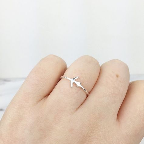 ☾ Silver ring with dainty airplane detail in the centre and a plain open back band. ☾   A I R P L A N E ∙ R I N G  ∙ Material: sterling silver.  ∙ Sizing: open backed design can be gently adjusted to fit. Due to this, we have also found that it works well as a pinky or midi ring when adjusted to a Airplane Ring, Aeroplane Travel, Aviation Jewelry, Travel Ring, White Gold Engagement Rings Vintage, Blue Diamond Engagement Ring, Promise Jewelry, Jewellery Trends, Half Moon Earrings