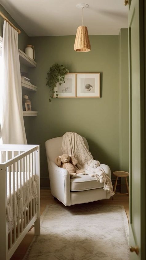 Olive Green Walls And Ceiling, Half Nursery Half Office, Green Rocking Chair Nursery, Cream Rocking Chair, Olive Green Accent Wall Nursery, Nursery Ideas Olive Green, Nursery Light Green Walls, Crib Corner Of Room, Small Nursery Paint Colors