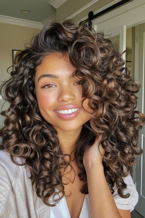 hair hairstyles,hair styles for long hair,hair cut,hair beauty,hair styles for medium hair,hair and skin and nails,hair hairstyling,hair length,hair straightener,hair drawing,hair cuts,hair colors #HairstyleTrends #HairTransformation #CurlyHairRoutine #BraidedHairstyles #HairColorInspiration #HairCareTips #ShortHairStyles #BalayageHair #WeddingHairstyles #HairAccessories #NaturalHair #HealthyHair #LongHairDontCare #MensHair #HairGoals #EasyHairstyles #HairGrowth #UpdoHairstyles #BlondeHair #HairProducts Colored Permed Hair, Haircuts For Curly Hair And Round Face, Curly Rounded Layers, Curly Haircuts Middle Part, Round Curly Haircut Long, Volume Curly Haircut, Hairstyles For Bushy Hair, Winter Curly Hair Color, Bangstyle Hair Long Curly