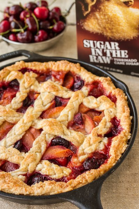 Can't choose between cherry or peach pie for dessert? Why not combine both with our Cherry-Peach Pie recipe made with Sugar In The Raw®. This pie is a perfect combination of fresh ripe peaches and tart summer cherries with a dash of cinnamon bringing all the delightful flavors together. With a homemade crust, this tasty summer pie is packed with twice the flavor all in one bite. Peach And Cherry Pie, Peach Cherry Pie, Peach Chess Pie, Mixed Berry Recipes, Cherry Crumb Pie, Peach Pie Recipe, Yummy Pie Recipes, Homemade Crust, Peach Pie Recipes