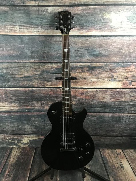 Black Les Paul, Custom Les Paul Guitar, Gibson Hollow Body Guitars, Gibson Les Paul Black, Black Gibson Sg Guitar, Gibson Les Paul Studio, Saints Row, Gibson Es 335 Black, Les Paul Guitars