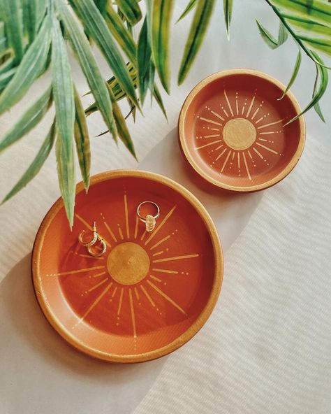 gifting made easy - choosing which one is the hard part Shop universal trinket trays — perfect for jewelry, candles, bar soap and more use code BOHOBABE @ checkout and save on your 1st purchase #trinkettray #paintedpottery #claypottery #mothersdaygift #bohohomedecor Boho Clay Plate, Terra Cotta Plate Painting, Terra Cotta Trinket Dish, Hand Painted Jewelry Dish, Terracotta Trinket Dish, Diy Jewelry Tray, Orange Trinket Dish, Gold Candle Holder, Clay Dish