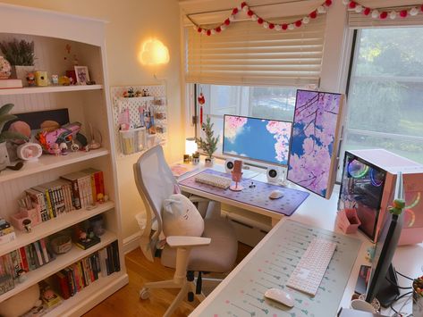 L-shaped desk with pink gaming setup and bookshelf on the left, white gaming chair with stuffed animal sitting on top Aesthetic Egirl, Cozy Desk, Interior Design Layout, Gamer Room Decor, Desk Inspiration, Bedroom Setup, Office Room Decor, Computer Room, Gaming Room Setup