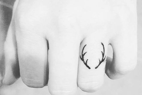 50 Of The Tiniest, Most Tasteful Tattoos Ever Tiniest Tattoos, Hanger Tattoo, Antler Tattoos, Antler Tattoo, Hirsch Tattoo, Finger Tattoo For Women, Deer Tattoo, Handpoke Tattoo, Tasteful Tattoos