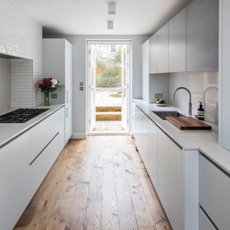 10 Narrow kitchen ideas – 10 ways to work this tricky shape | Ideal Home Narrow Kitchen Ideas, Narrow Kitchen Design, Classical Kitchen, Wall Cupboards, Small Kitchen Layouts, Narrow Kitchen, Corner Cupboard, Kitchen Colour Schemes, Solid Doors