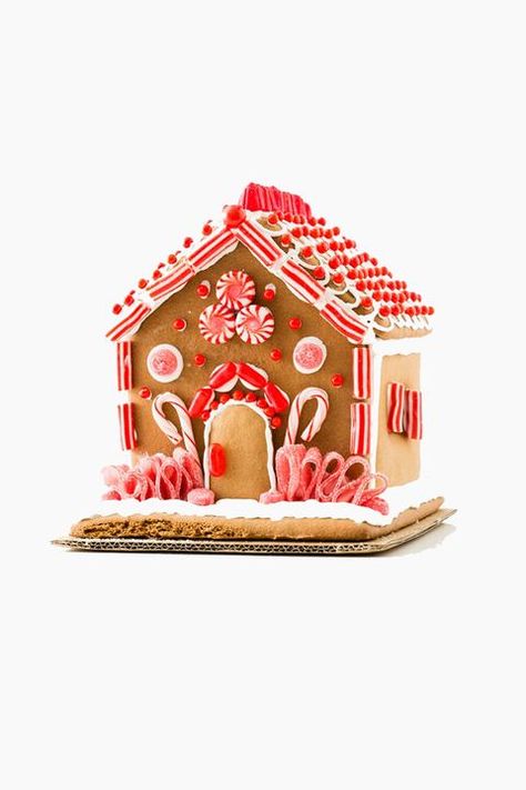 gingerbread house candy cane Best Gingerbread House, Hay Bale Decorations, White Gingerbread House, Graham Cracker Gingerbread, Graham Cracker Gingerbread House, Easy Gingerbread House, Gingerbread Castle, Candy Cane Gingerbread, Homemade Gingerbread House