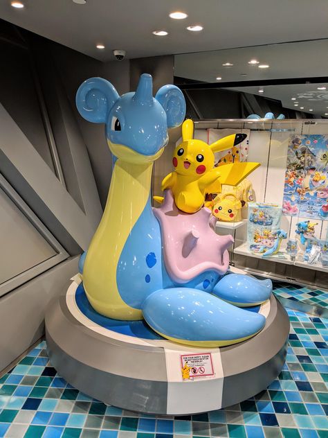 Pikachu & Lapras Statue @ Pokemon Center Singapore Pokemon Items, Dragon Master, Pokemon Room, Pokemon W, Pokemon Firered, Play Pokemon, Pokemon Center, Pokemon Stuff, Nintendo Art