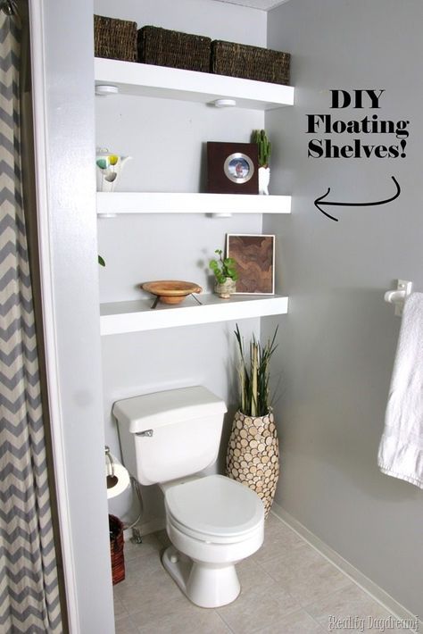 DIY Floating Shelves in Bathroom above toilet {Reality Daydream} Shelves Above Toilet, Regal Bad, Above Toilet, Shelves Over Toilet, Bathroom Shelves Over Toilet, Floating Shelf Decor, Toilet Shelves, Bathroom Shelf Decor, Diy Regal