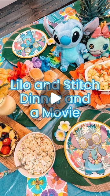 Heather Tenneson on Instagram: "Happy Stitch Day! Last week we celebrated Experiment 626 with a Lilo and Stitch Dinner and a Movie night with some good friends. We both have Stitch obsessed girlies, so we were thrilled to have them come and join in on the fun. 💙  On the menu: - Ohana Pinapple Salsa and Chips - Stitch’s Luau Pulled Pork Sliders - Experiment 626 Macaroni Salad - Island Roller Coaster Ride Pina Colada Cupcakes - Dole Whip Floats and Pina Colada Mocktails  This is the first movie night we’ve done from @thefairytalefoodie’s newest Dinner and a Movie cookbook and she absolutely nailed the island flavors. Every single dish was packed full of flavors straight from Hawaii. It was a culinary experience and a fun time fellowshipping with friends 🩵❤️🤍   #disneydinnerandamovie #disn Stitch Charcuterie Board, Stitch Food For Party, Lilo And Stitch Sleepover, Lilo And Stitch Menu Ideas, Lilo And Stitch Dinner And A Movie, Stitch Party Food Ideas, Stitch Birthday Food Ideas, Lilo And Stitch Desserts, Lilo And Stitch Dinner