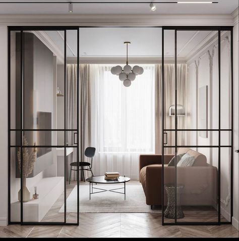 Glass Living Room Wall, Glass Separation Wall Living Rooms, Entry Partition Design, Glass Room Partition, Internal Window Between Rooms, Glass Partition Designs Living Rooms, Living Room Separator, Room Separator Ideas, Glass Divider