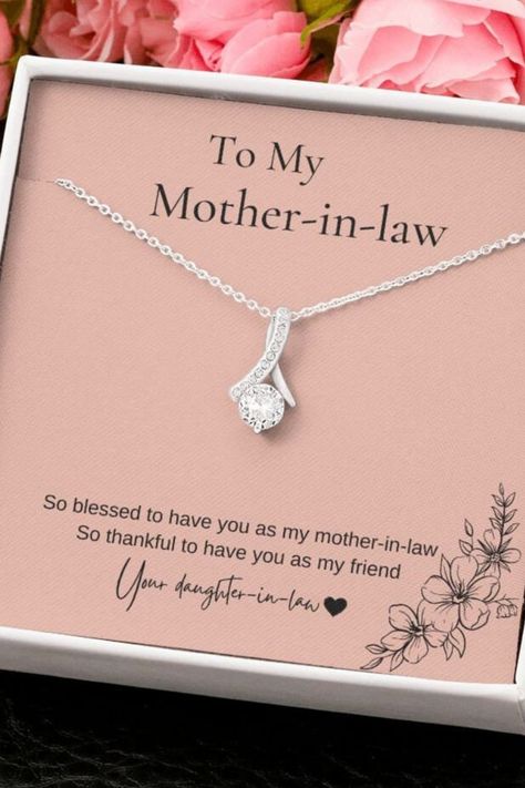 Did you ask for the perfect gift for your mother-in-law? The petite ribbon-shaped pendant is finished with 14K white gold over stainless steel and is embellished with dainty clear crystals surrounded by a sparkling 7mm round cut Cubic Zirconia. The adjustable cable chain allows the necklace to be worn at 18" to 22" in length. Gift Mother In Law, Mother In Law Birthday, Delicate Gold Jewelry, Mother In Law Gifts, Mother Birthday Gifts, To My Mother, Gold Gift, Saint Petersburg, Clear Crystals