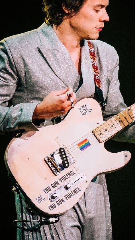 harry styles blm end gun violence lgbtq guitar Harry Styles Guitar, White Guitar, On Stage, Harry Styles, Electric Guitar, Guitar, White