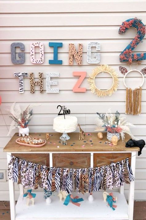 Check out this fun boho zoo-themed birthday party! What a cute dessert table! See more party ideas and share yours at CatchMyParty.com Zoo Party Ideas Decorations, Two The Zoo Birthday Party Girl, Zoo Birthday Theme, 2nd Birthday Zoo Theme, Zoo Birthday Party Ideas Decoration, Zoo Party Theme, Two Zoo Birthday Party, Zoo Themed Birthday Party Decorations, Two At The Zoo Birthday Party