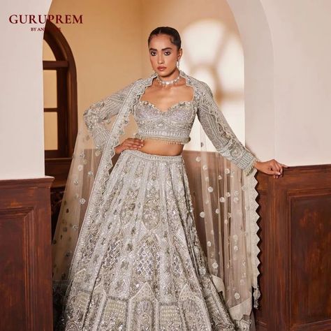 Radiate sophistication in a silver-bright lehenga choli that sparkles with every move. Perfect for making a statement at any celebration. Email : guruprem.socialmediateam@gmail.com Contact Us :+91 8169787646 #SilverLehenga #BrightLehenga #LehengaCholi #IndianFashion #BridalWear #SparklingFashion #ElegantAttire #FestiveWear #GlamorousStyle #TraditionalWear #LuxuryLehenga #FashionInspo #BridalElegance #DesignerWear #LehengaLove #IndianBridal #FashionGoals #CulturalFashion #ShinyAttire #Weddi... Bright Lehenga, Bridal Elegance, Elegant Attire, Glamorous Style, Lehenga Choli, Designer Wear, Indian Bridal, Festival Wear, Bridal Wear