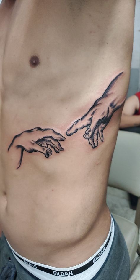 Hand God Tattoo, Creation Of Adam Tattoo Back Of Neck, Michaelangelo Hands Tattoo, Angel Stomach Tattoos For Guys, Hand Of God Tattoo, Michael Angelo Hands Tattoo, Michaelangelo Tattoos, Creation Of Adam Tattoo Ribs, Adam’s Creation Tattoo