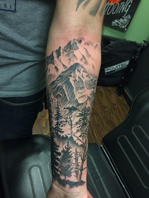 I love designing in such a way as to bring depth and dimension into a piece, especially when the work inspires me to get my ass outside to look at some trees!  #ryanthompsontattoos #tradewindstattoo #njtattooartist #tomsriver #tattooartist #trustyourartist #tattoosleeve #sleeve #blackandgreytattoo #blackandgrey #nocturnaltattooink #inked #guyswithtattoos #inkedguys #tattoos #outdoortattoo #realistictattoo #blackandgreyrealism #mountaintattoo #treetattoo #optoutside #outdoorsy #climbmountains Mountain Sleeve Tattoo, Tattoo Sleeve Cover Up, Forest Tattoo Sleeve, Moutain Tattoos, Natur Tattoo Arm, Forearm Cover Up Tattoos, Tree Sleeve Tattoo, Nature Tattoo Sleeve, Forarm Tattoos