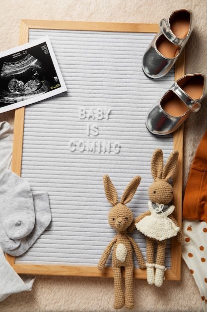 Free photo flat lay pregnancy announceme... | Free Photo #Freepik #freephoto #pregnancy-announcement #still-life #announcement-board #flat-lay Flat Lay Pregnancy Announcement, Safe Nursery, Announcement Board, Practical Baby Shower Gifts, Baby Gift Guide, Adorable Nursery, Stylish Nursery, Adorable Newborn, Cozy Moments