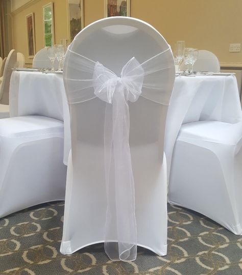 Foldable Chair Covers Wedding, White Chair Cover With White Sash, Wedding Chair Covers And Sashes, Seat Covers Wedding, Wedding Chair Cover Ideas, Wedding Venue Chairs, Wedding Seat Covers, Bow Chair, Brides Chair