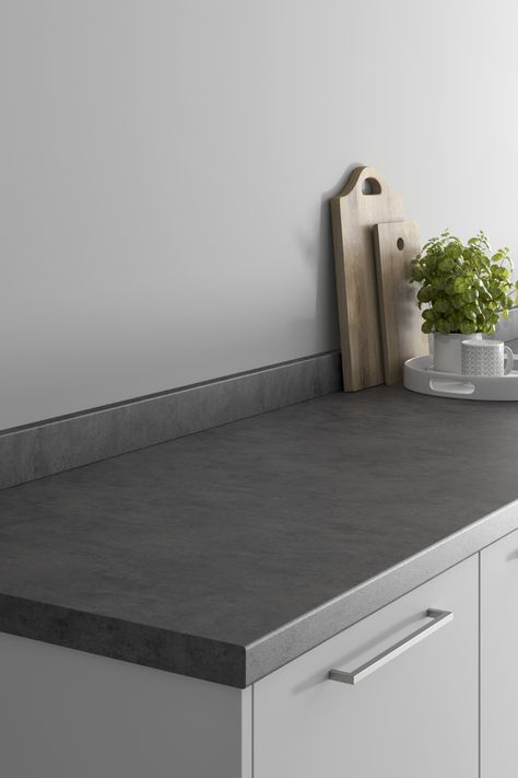 Our Howdens Pure Slate Effect Laminate Worktop is a great place to start if you're looking for slate effect kitchen countertop ideas or laminate kitchen worktop ideas. They look amazing next to light grey kitchen cabinets and light grey walls to create a modern kitchen design. Finish with chrome kitchen hardware. Grey Kitchen Worktop Ideas, Waterfall Worktop, Grey Worktop Kitchen, Dark Grey Countertops, Slate Kitchen Countertops, Chrome Kitchen Hardware, Gray Kitchen Countertops, Light Grey Kitchen Cabinets, Grey Kitchen Walls