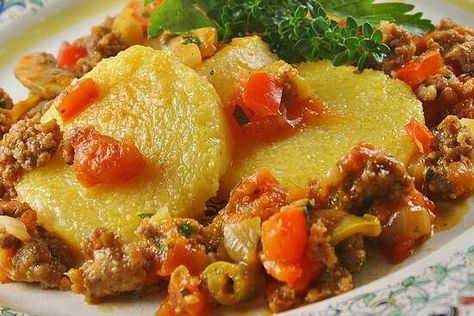 Polenta with Spicy Sausage-Veggie Sauce Recipe | Allrecipes Tube Polenta Recipe, Veggie Sauce, Turkey Italian Sausage, Baked Polenta, Polenta Fries, Summer Appetizers Easy, Vegetarian Sausages, Polenta Recipes, Hot Italian Sausage