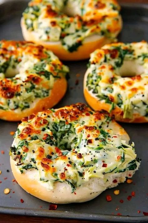 Chef Bobby Flay | Cheesy Spinach-Artichoke Bagels 🥯🧀 Parmesan Artichoke, Canned Artichoke, Chef Bobby Flay, Canned Artichoke Hearts, Bagel Recipe, Bobby Flay, Fresh Spinach, Artichoke Hearts, Spinach Artichoke