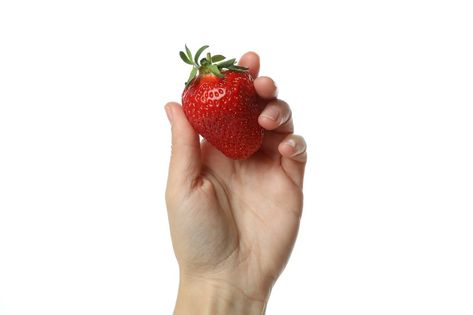 Female hand holds fresh strawberry, isolated on white background Strawberry Reference, Holding Strawberry, Fresh Strawberry, Holding Hands, White Background, Hold On, Fruit, White, Art