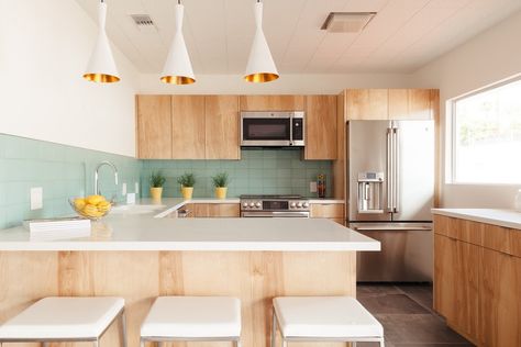 Tough Love: 4 Kitchen Countertop Materials That Are Equal Parts Durable and Beautiful | Hunker Mint Green Kitchen, Installing Kitchen Cabinets, Midcentury Kitchen, Clean Kitchen Cabinets, White Tile Backsplash, Kitchen Island Ideas, Kitchen Countertop Materials, Modern Flooring, Stools For Kitchen Island