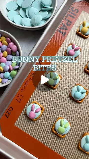 Cheese, Charcuterie, Fun Food Boards & MORE on Instagram: "•BUNNY PRETZEL BITES•  ➡️➡️ Did you know 2 M&M’s make the cutest little bunny? One for the head and one cut in half for 2 ears!! 🤯🐰😍   INGREDIENTS: square pretzels  candy melts (any spring color) M&M’s plain candies   HOW TO: 1. Preheat oven to 200°. Cut a handful of M&M’s in half.  2. Space pretzels out on a baking sheet.  3. Top each pretzel with 1 candy melt. Bake for 4-5 minutes or until candy melts start to soften. They will look wet, but still hold their shape.  4. Take out of oven and start placing the @mmschocolate . One for the body and two matching halves for the ears. Let harden for 20-30 minutes and then ready to eat. They are adorable and a perfect salty/sweet bite! 😋  #eastertreat #easterbunnies #easterideas #east Pretzel Candy Melts, Candy Melt, Food Boards, Spring Color, Candy Melts, Easter Treats, Fun Food, Sweet And Salty, Pretzel Bites