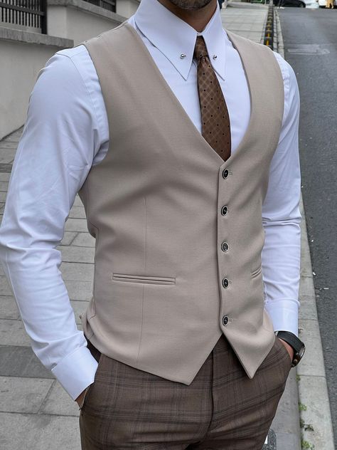 NEW COLLECTİON - FW / 23Collection: Fall / Winter - 23Production: Private Collection Slim-fit Wool Beige Men’s WaistcoatProduct color: BEİGEProduct material: %40 Wool , %30 Viscon , %25 Polyester , %5 ElestanProduct details: The waistcoat is adjustable from the back.Product care: Dry clean onlyProduct size: 48-50-52-54-56-58Package İncluded : Waistcoat Dimensions of the mannequin: 185cm / 78kg , Size : 50EU / 40US Sute Designs Men, Beige Waistcoat Outfit, Mens Vest Outfits, Waistcoat Designs For Men, Outfit With Vest, Men Formal Outfit, Men Vest Outfits, Vest Outfits Men, Waistcoat Outfit