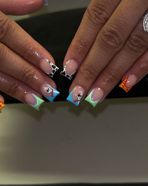 Toy story baby shower nails ☁️🤠🚀🩵 #nailtech #toystorynails #blacknailtech #jacksonmsnailtech #msnailtech #atlnailtech #shortnails #squarenails Baby Shower Nails For Boys, Toy Story Nails Short, Baby Nails Design, Chucky Nails, Baby Shower Nails Boy, Short Nails Blue, Kaws Nails, Toy Story Nails, Shower Nails