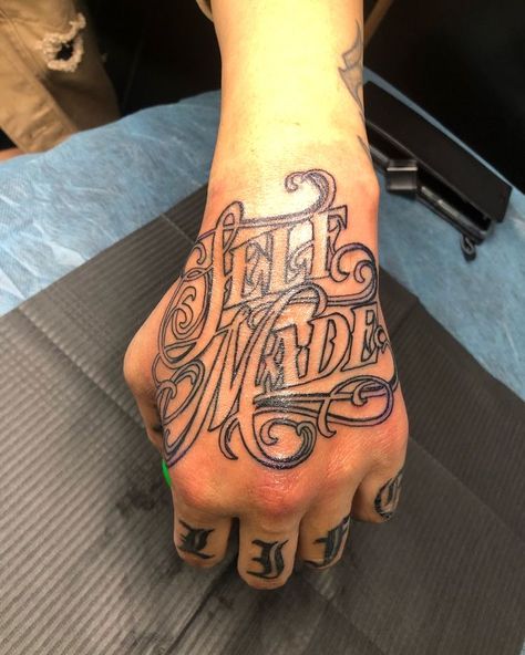 Self Made Hand Tattoos For Men, Hustle Hand Tattoo, Dope Hand Tattoos For Guys, Hand Tattoos With Names, Free Hand Tattoo Ideas, Money Hand Tattoos For Guys, Hood Hand Tattoos For Men, Gangsta Hand Tattoos, Thug Angel Tattoo