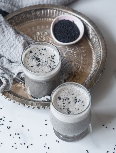 Iced Black Sesame Latte | Nourish Deliciously Black Tea Latte Recipe, Coconut Manna, Sesame Seeds Recipes, Tea Latte Recipe, Coffee Aesthetics, Caffeine Drinks, Black Sesame Seeds, Latte Recipe, Black Sesame