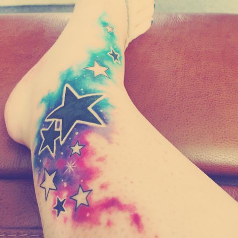 Star Cover Up Tattoos For Women, Galaxy Cover Up Tattoo, Star Tattoo Cover Up Ideas, Star Tattoo Cover Up, Star Tattoos Colorful, Watercolour Star Tattoo, Colorful Star Tattoos, Watercolor Galaxy Tattoo Sleeve, Colorful Moon And Stars Tattoo