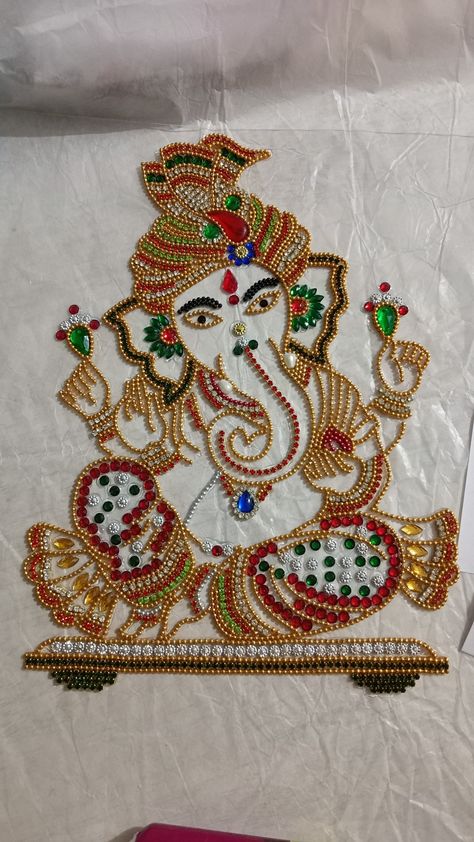 Kundan rangoli.. made by me...new 2022 Dasara Photo, Machi Work, Bird Silhouette Art, Ganesha Rangoli, God Pic, Kundan Rangoli, Venkateswara Swamy, Peacock Embroidery Designs, Aari Design