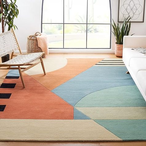 Amazon.com: SAFAVIEH Rodeo Drive Collection Area Rug - 6' x 9', Gold, Handmade Mid-Century Modern Abstract Wool, Ideal for High Traffic Areas in Living Room, Bedroom (RD863A) : Home & Kitchen Southwest Rugs, Rugs Direct, Therapy Office, Rodeo Drive, Gold Rug, Rug Direct, Orange Area Rug, Abstract Rug, Hand Tufted Rugs