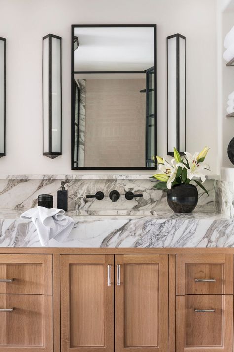 Marble Mitered Front Countertop in the bathroom paired with a white oak vanity + black fixtures | BHDM Design Primary Bath, House Updates, Primary Bathroom, Bathroom Design Inspiration, Marble Vanity, Luxe Interiors, Marble Bathroom, Mug Design, Counter Tops