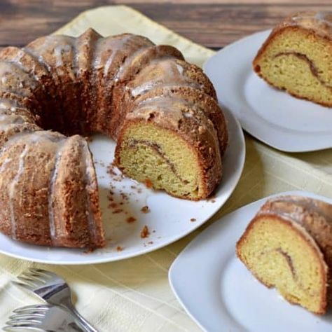 This Sour Cream Coffee Cake Recipe, topped with a delicate glaze, is so light and refreshing no one will guess its gluten free. A must try for coffee cake lovers, this tender dessert is perfect as a breakfast treat or after dinner indulgence. #glutenfreecake #coffeecake #glutenfreedessert Coffee Cake Gluten Free, Sour Cream Coffee Cake Recipe, Baked Oreo Cheesecake Recipe, Gluten Free Banana Muffins, Gluten Free Blueberry Muffins, Oreo Cheesecake Recipes, Gf Food, Cake Gluten Free, Pumpkin Chocolate Chip Bread