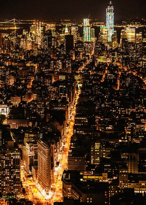 🌆✨ Capture the iconic essence of New York City with this stunning photo print, taken on a crisp fall evening from the top of the Empire State Building. Looking south towards downtown Manhattan, this breathtaking shot showcases the famous Flatiron Building and the glowing intersections of 5th Avenue and Broadway, bringing the city's electric energy to life in vibrant black and tungsten yellow lights. Perfect for your living room, office, or kitchen, this travel-inspired print infuses any spac... Queensboro Bridge New York City, Yellow City Lights, Grunge Angel, 5th Avenue New York, Fall Evening, Electric Energy, Flatiron Building, Downtown Manhattan, The Empire State Building