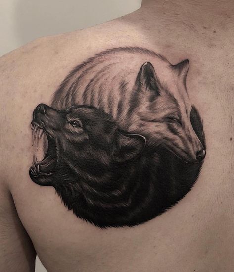 Yin Yang inspired wolf tattoo by Sara Strange. Done at Chronic Ink Tattoos - Toronto, Canada Two Wolves Tattoo, Kurt Tattoo, White Wolf Tattoo, Ying Yang Tattoo, Yang Tattoo, Wolf Tattoo Sleeve, Yin Yang Tattoos, Kunst Tattoos, Geometric Tattoo Arm