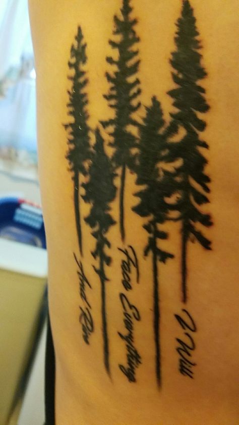 First tattoo of pine trees and the phrase "I will face everything and rise" on my ribs Pine Tree Tattoo With Words, Pine Tree Rib Tattoo, Pine Tree Tattoo Side Rib, Feminine Pine Tree Tattoos, Men’s Pine Tree Tattoo, Name Tree, Face Everything And Rise, Heartbeat Tattoo, Pine Tree Tattoo