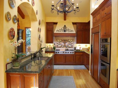 HGTV.com has inspirational pictures, ideas and expert tips on galley kitchen designs for an efficient and attractive kitchen space. Small Galley Kitchen Designs, Tuscany Kitchen, Tuscan Kitchen Design, Tuscan Kitchens, Tall Kitchen Cabinets, Small Farmhouse Kitchen, Galley Kitchen Design, Italian Home Decor, Galley Style Kitchen