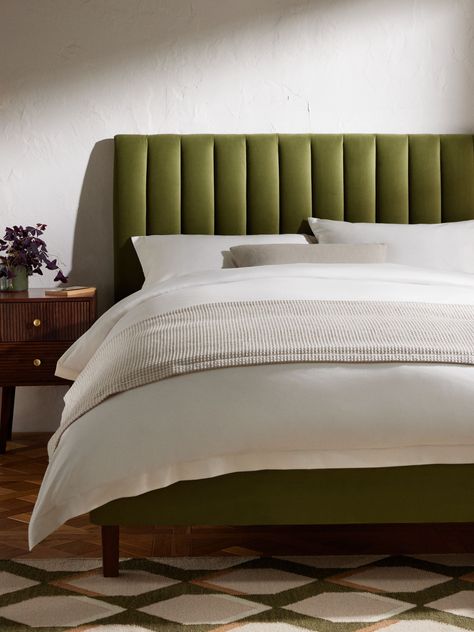 We've made the headboard a defining design element of the Fluted bed frame, adding extra padding to give the bed an elegant, curved side profile and giving even more depth to the flutes. Finished with a tapered dark stain leg to ensure the bed looks just as good in both traditional and contemporary rooms. Made from high-quality timbers. Its sprung slats provide a more supportive foundation for your mattress.  Assembly service Our assembly service is included in the selling price for our Made to Olive Green Velvet Headboard, Green Bed Head, Light Green Bed Frame, Fluted Bed Frame, Olive Green Bed Frame, Green Bed Bedroom Ideas, Green Bed Frame Bedroom Ideas, Bedroom With Green Bed, Green Bed Bedroom