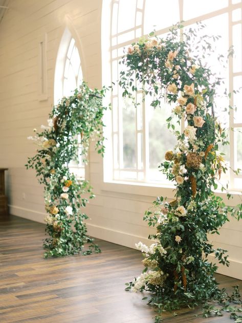 Assymetrical floral arches in desert hues frame this chapel's mirrors, giving an utterly romantic space for a couple to exchange their vows. #wedding #weddingaltar #RomanticAlFrescoAffair Assymetrical Arch Wedding, Partial Arch Wedding, Split Arch Wedding, Deconstructed Arch Wedding, Asymmetrical Wedding Arch, Arch Inspiration, Desert Tones, Al Fresco Wedding, Floral Arches